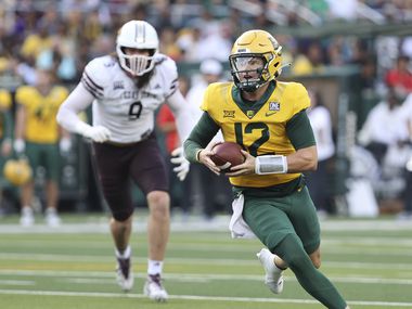 Baylor quarterback Blake Shapen runs for a touch down against Texas State in the first half...